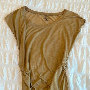 Short sleeve top mix between a tan/gold color/ would look great paired w jeans!